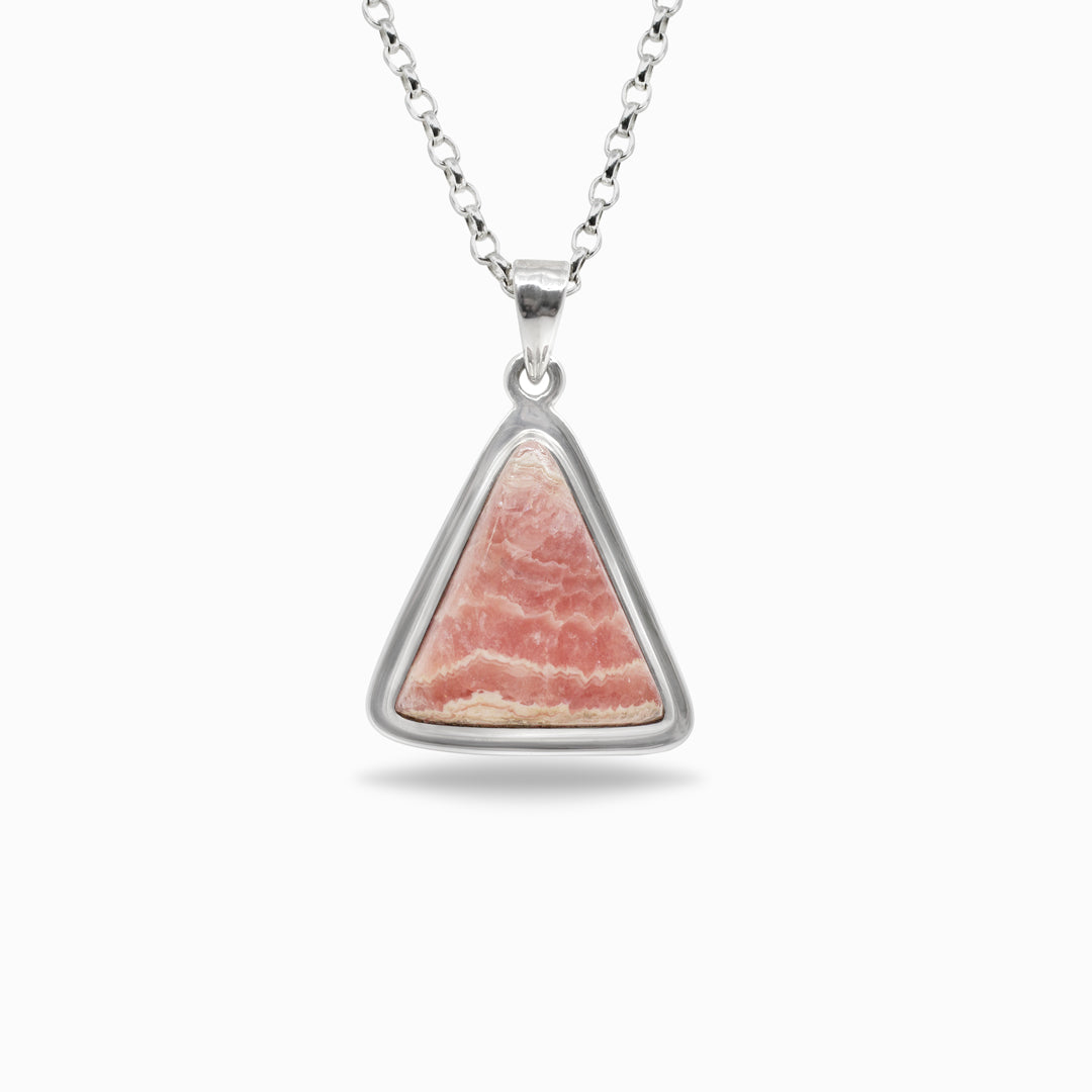 Necklace with a triangular pink stone pendant on a white background