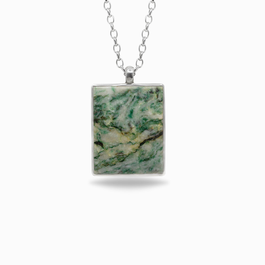 Necklace with a rectangular green and white marbled pendant on a white background