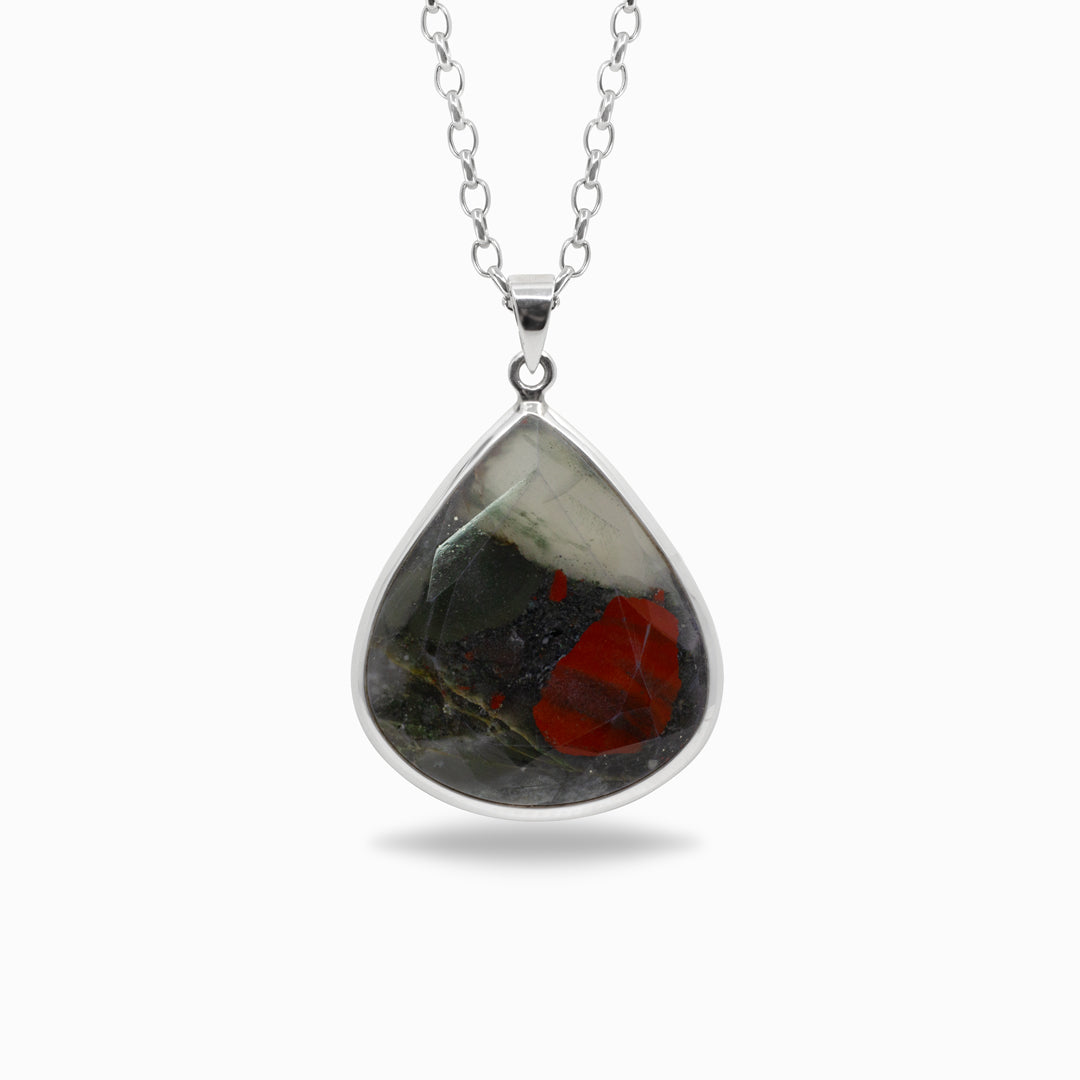 Teardrop-shaped necklace on a white background