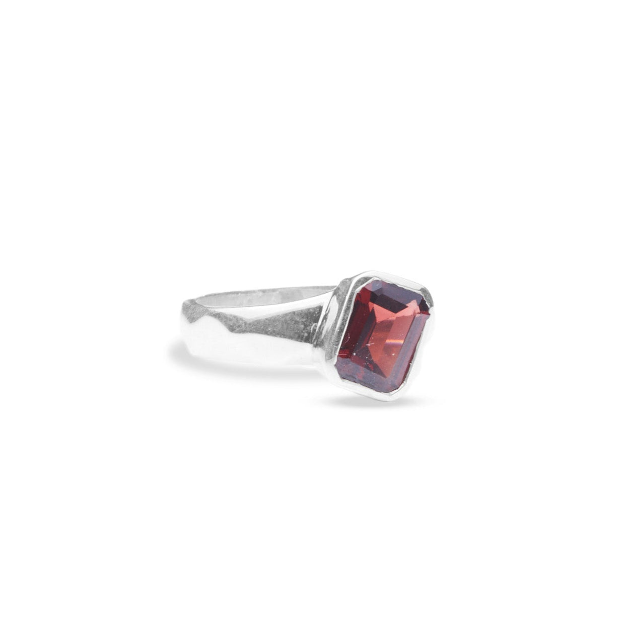 Garnet rectangle cushion ring offset with diamond cut band front angle