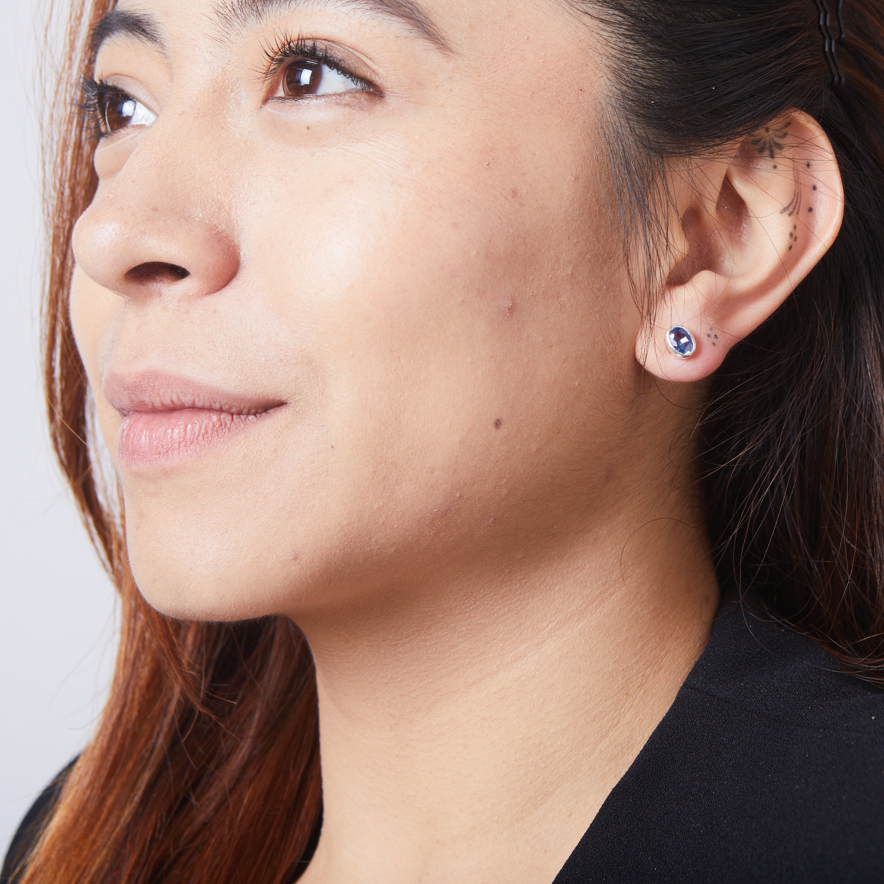 kyanite oval faceted stud earrings on model
