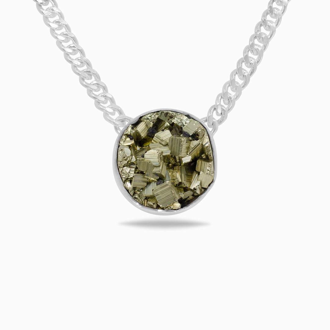 Silver necklace with a round pendant featuring a metallic gemstone on a white background