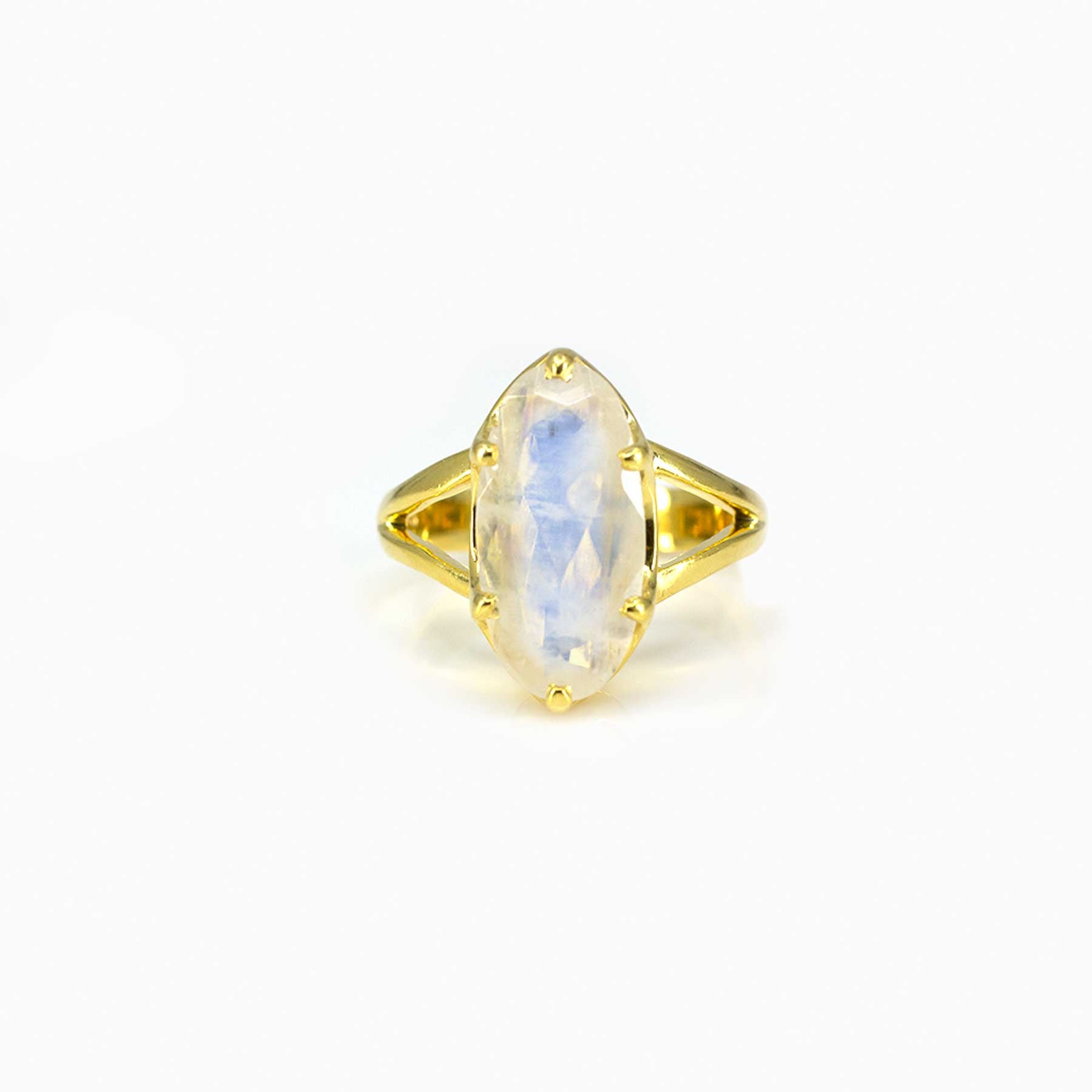 Gold ring with Moonstone on a white background