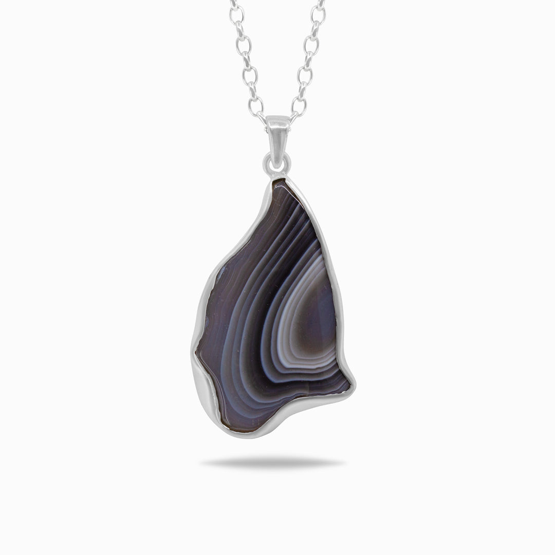 Agate silver pendant necklace on a white background