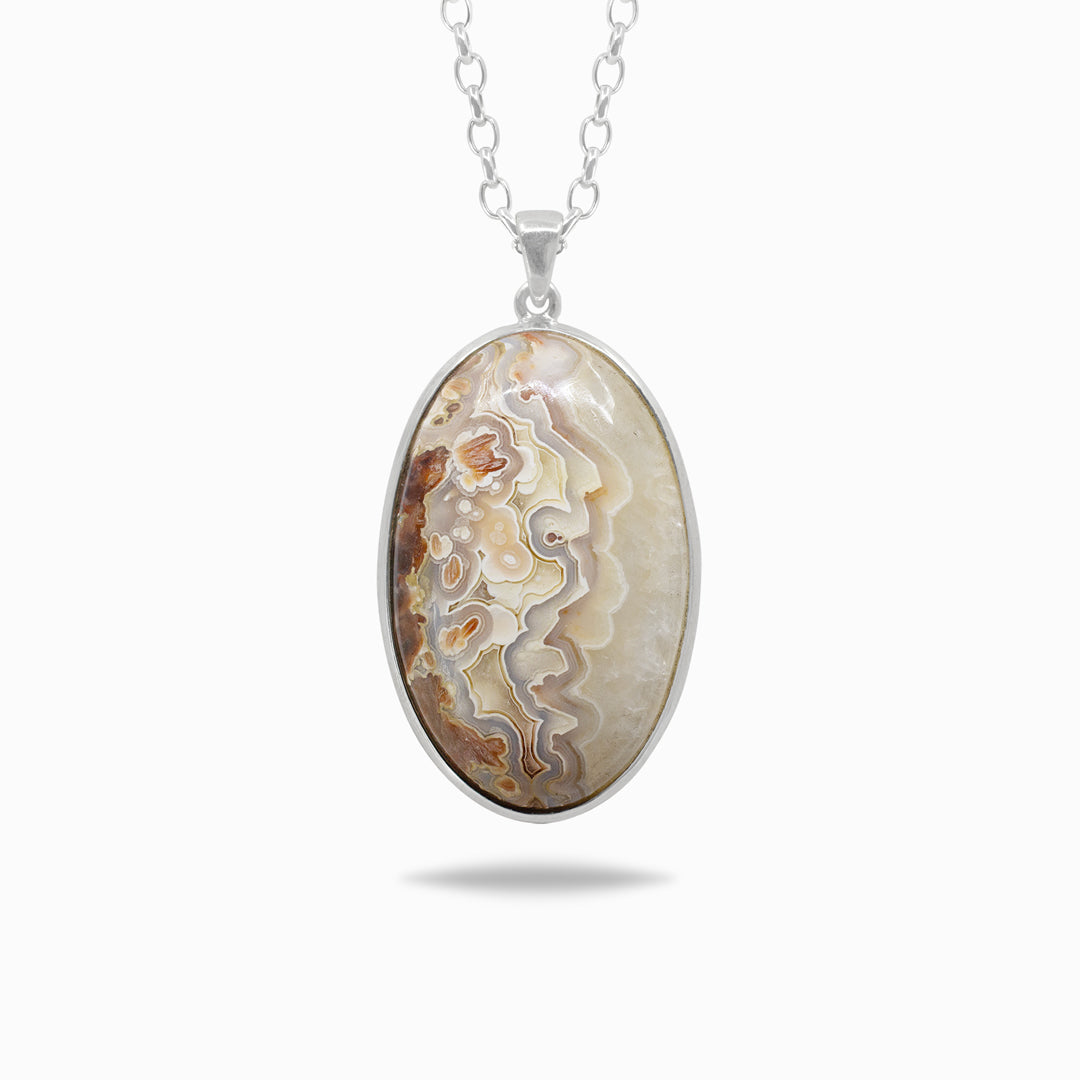 Silver necklace with an oval stone with white and brown patterns on a white background