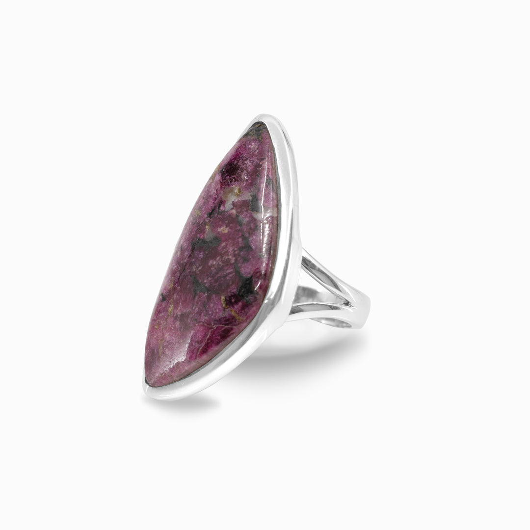 Silver ring with a freeform gemstone on a white background