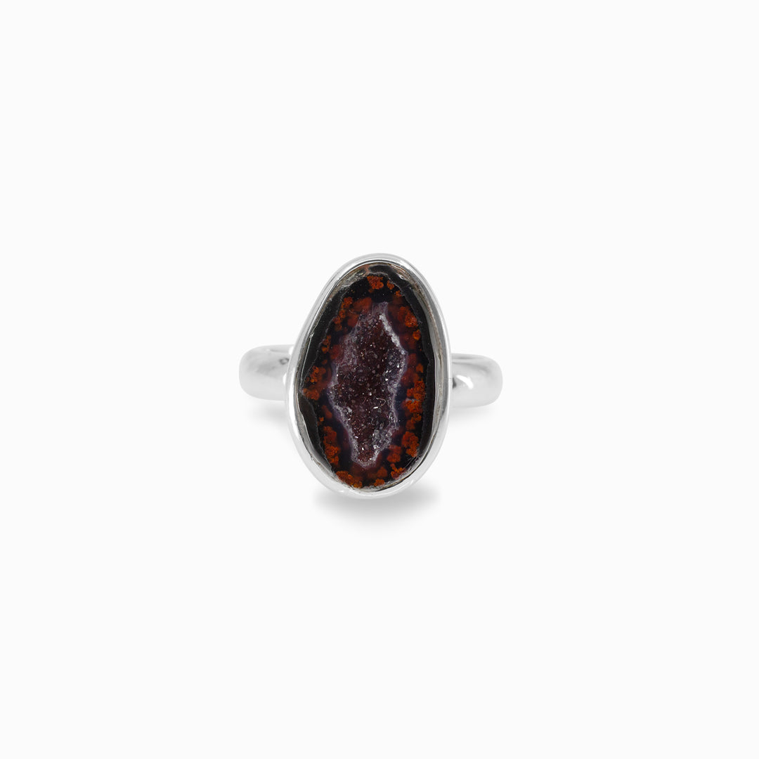 Silver ring with freeform druzy stone on a white background