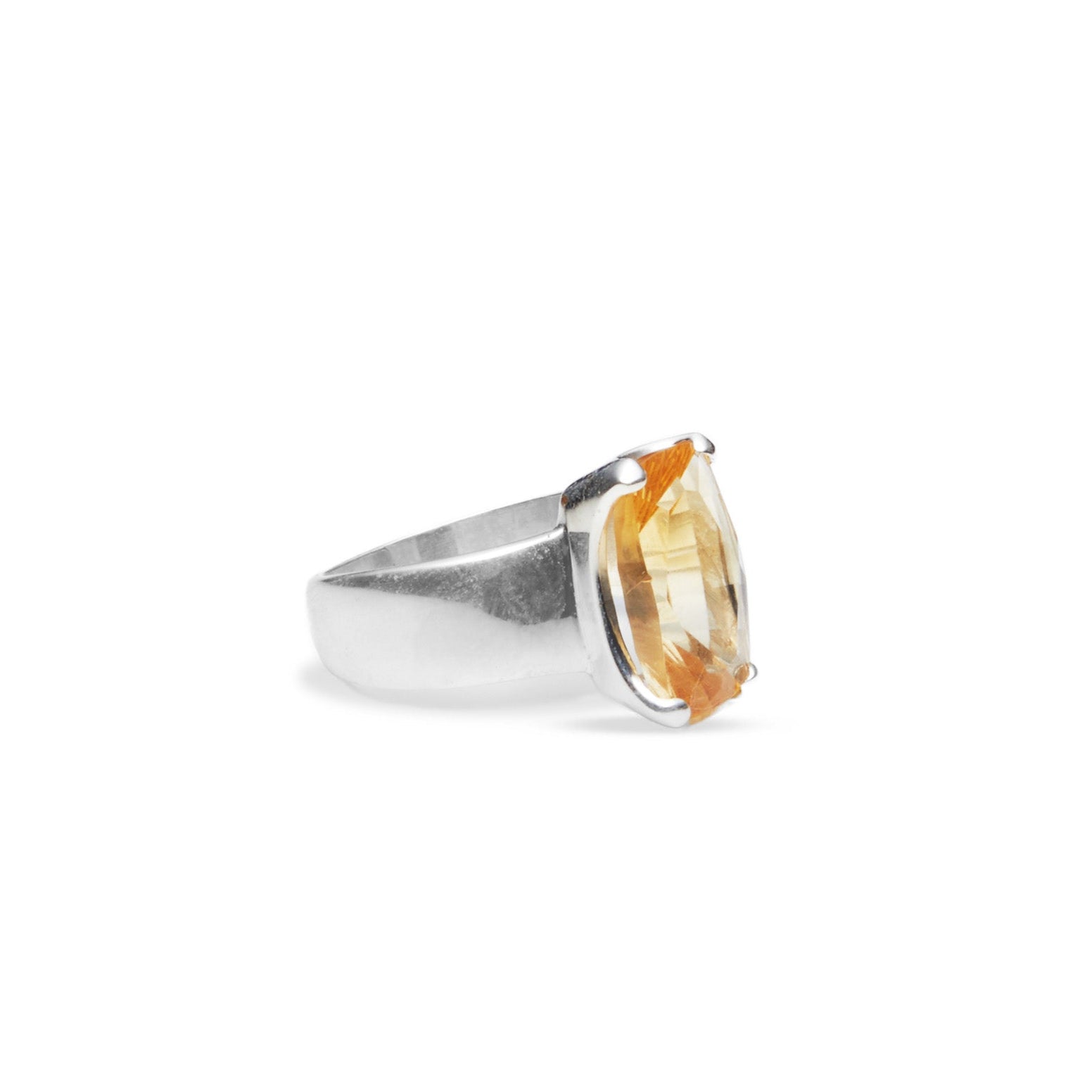 Citrine faceted ring with claw setting on thick band side angle
