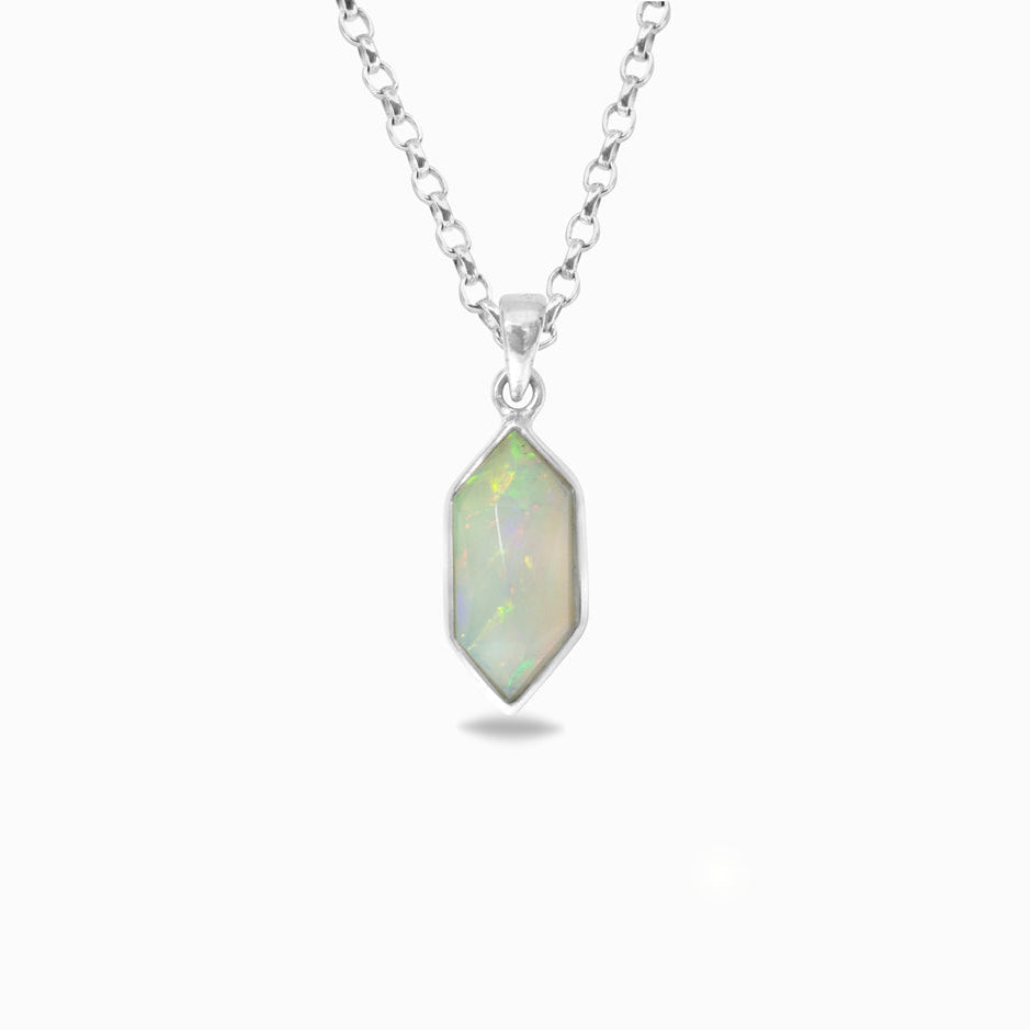 Necklace with a pendant featuring an opal stone on a white background