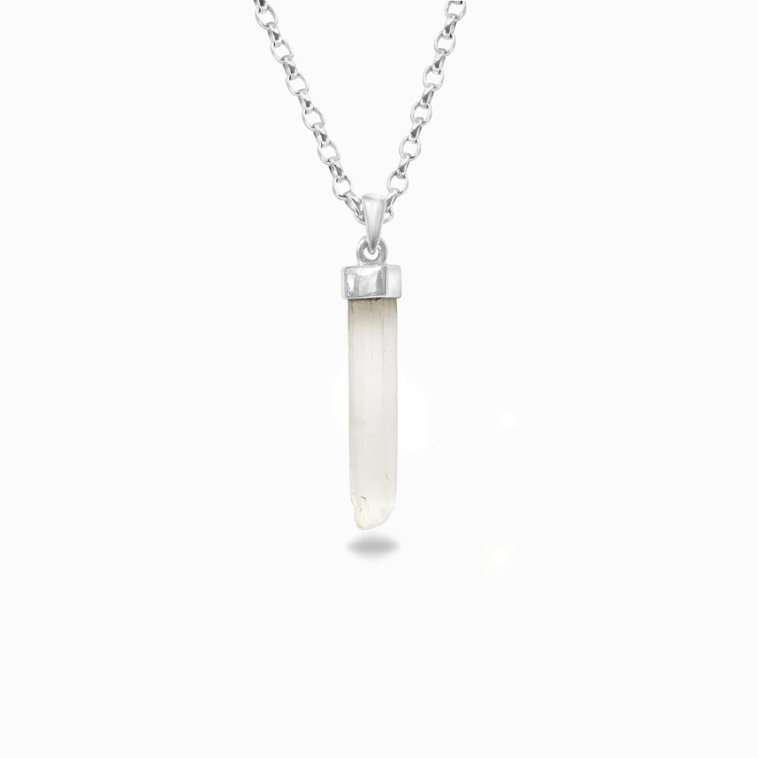 Necklace with a clear pendant on a white background