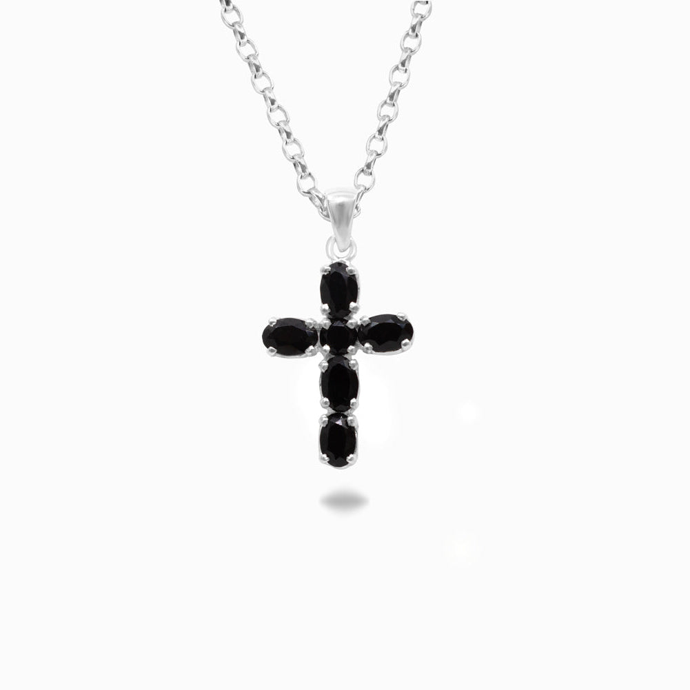 Black cross pendant necklace on a white background