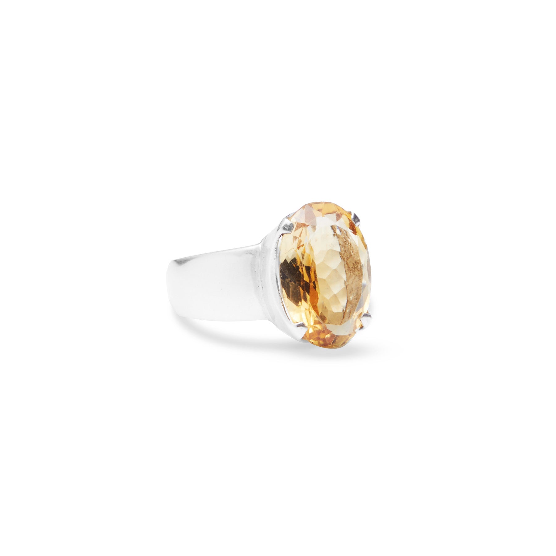 Citrine oval laser cut facet with sterling silver claw bezel on thick band