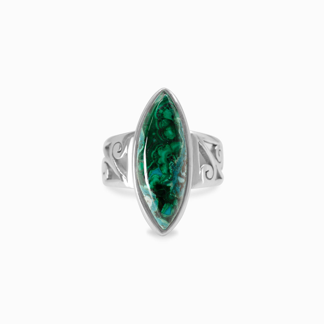 Silver ring with a blue and green gemstone on a white background