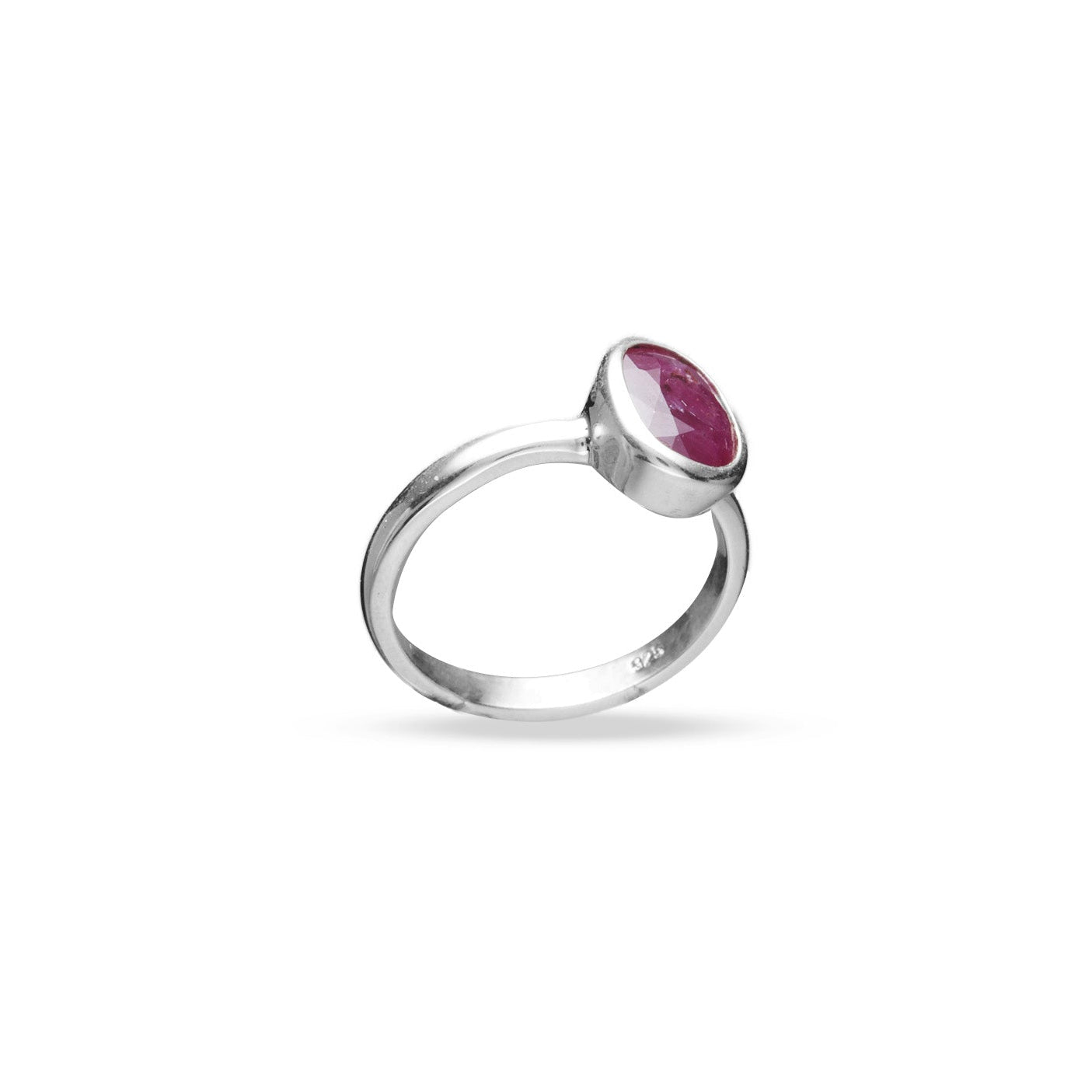 Ruby oval faceted bezel set ring under side