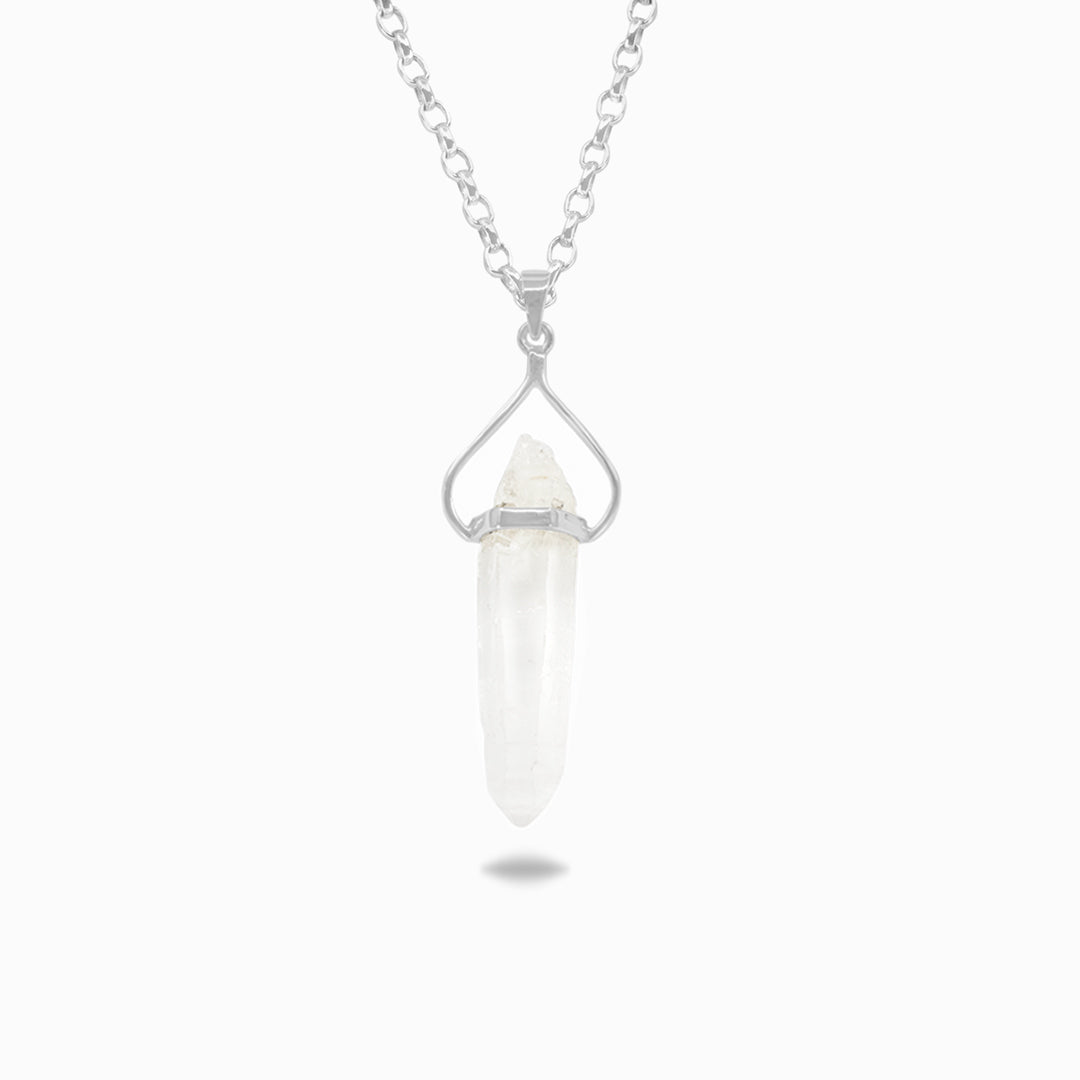 Silver necklace with clear gemstone on a white background