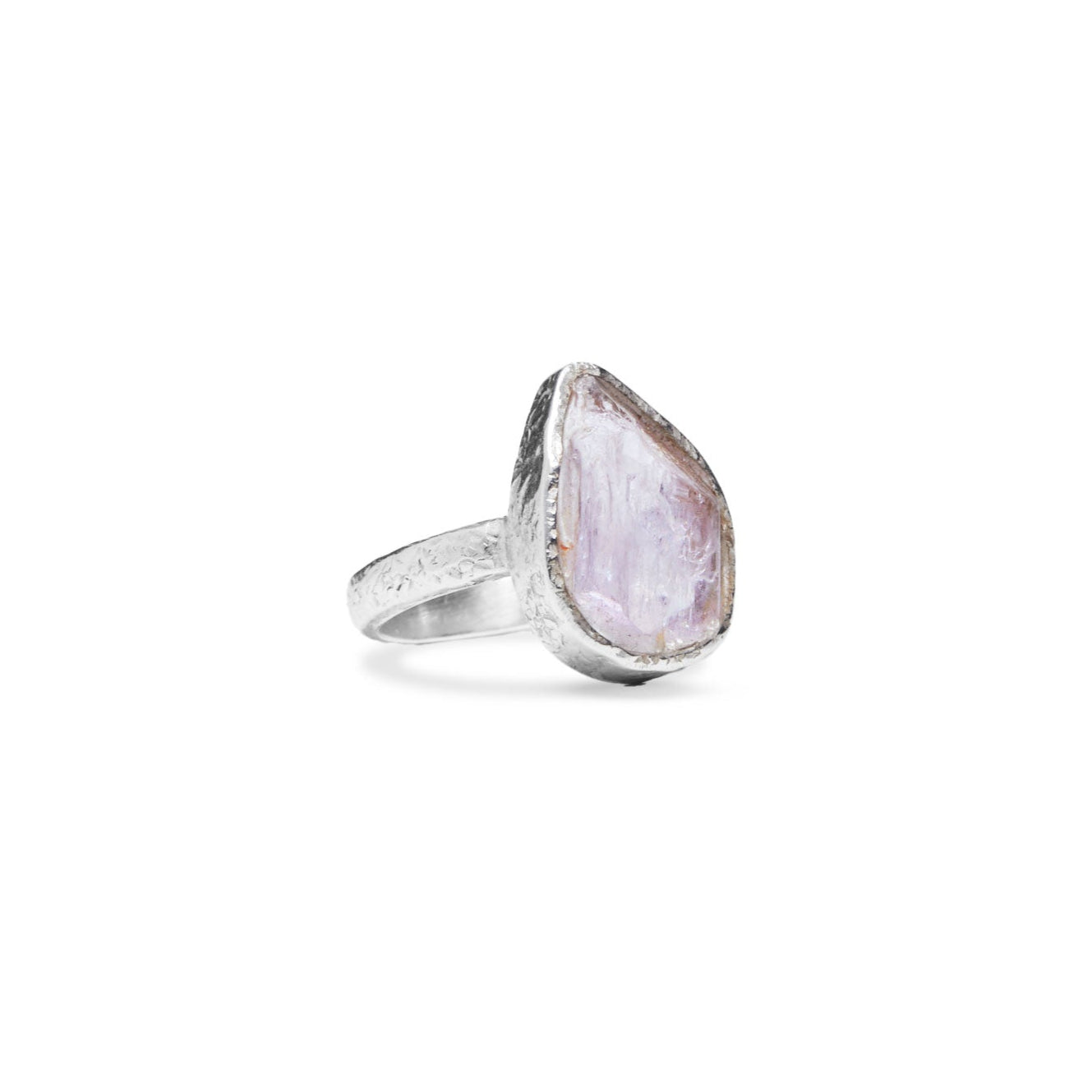 Silver ring with a pink teardrop-shaped gemstone on a white background