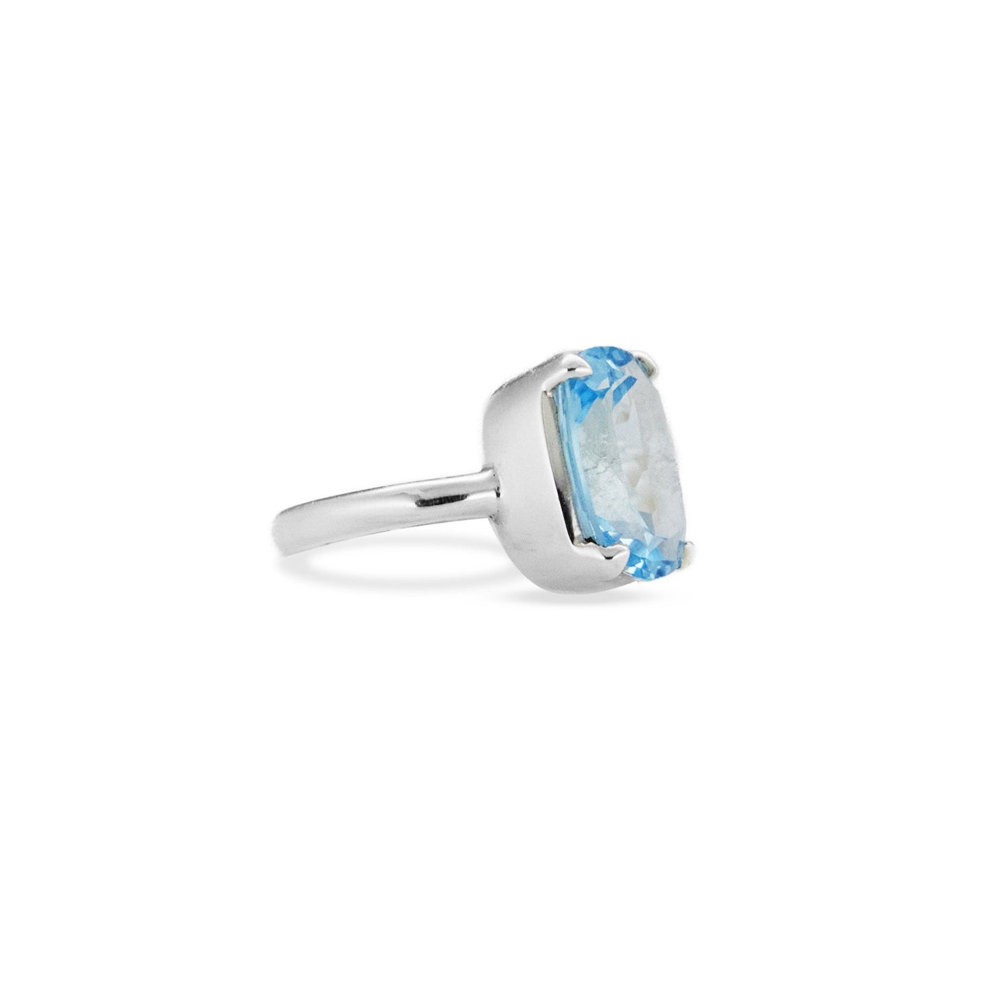 Blue Topaz cushion cut faceted claw set Ring