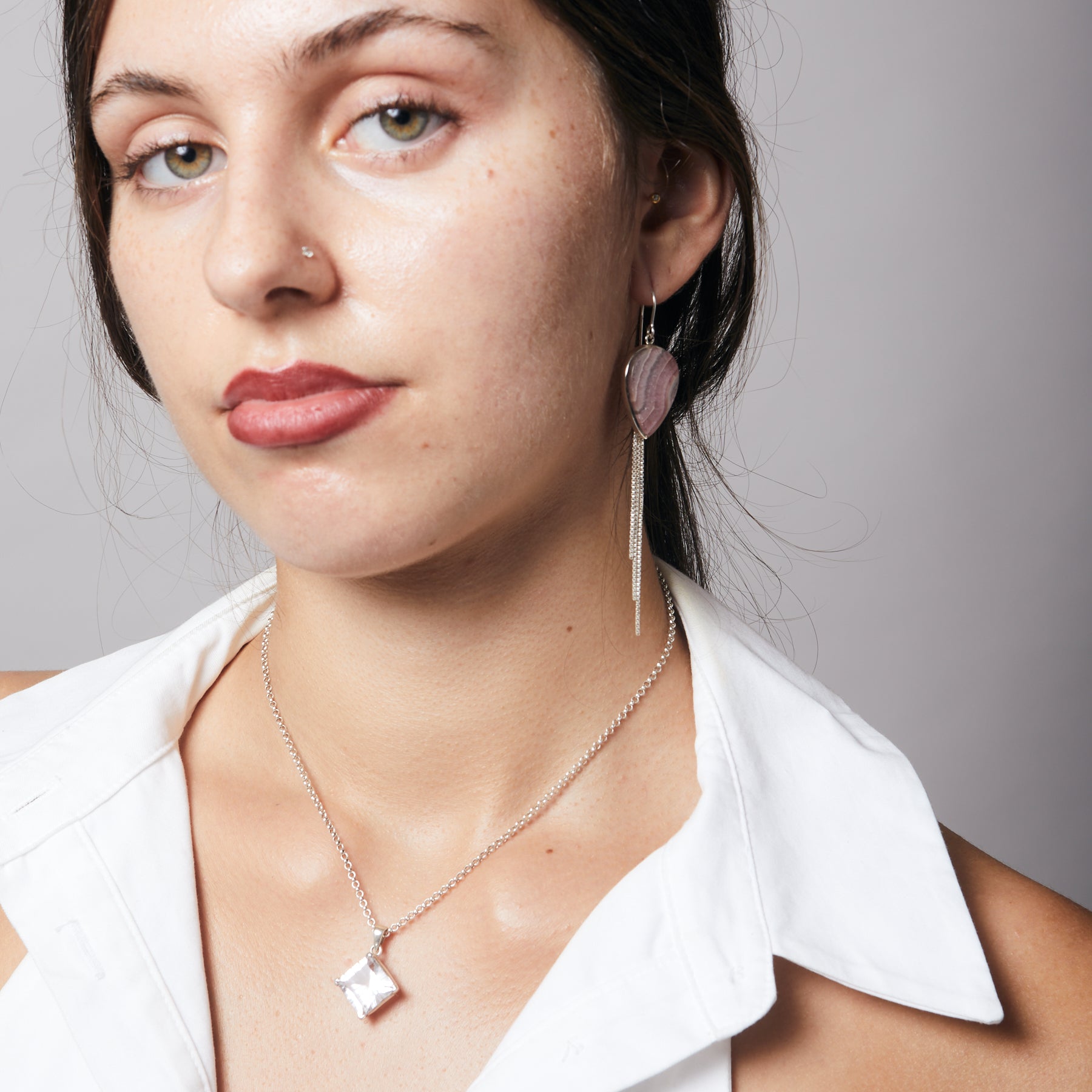 Rhodochrosite inverted teardrop cabochon bezel set Drop Earrings with dangling sterling silver chains