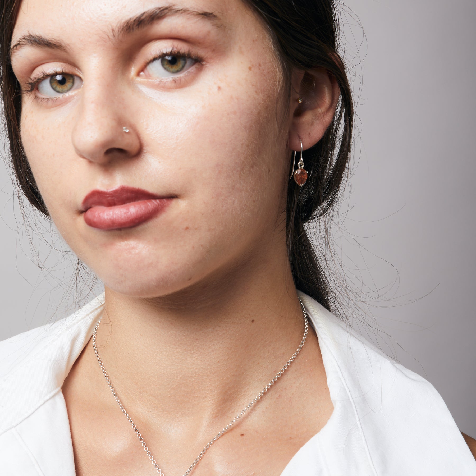 Sunstone faceted inverted teardrop claw set Drop Earrings