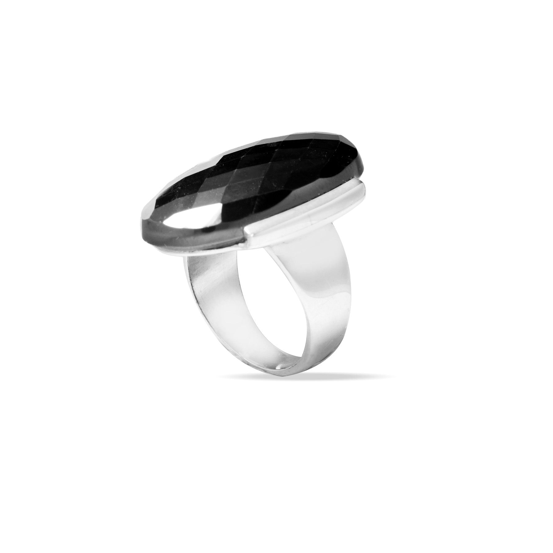 Silver ring with a metallic stone on a white background