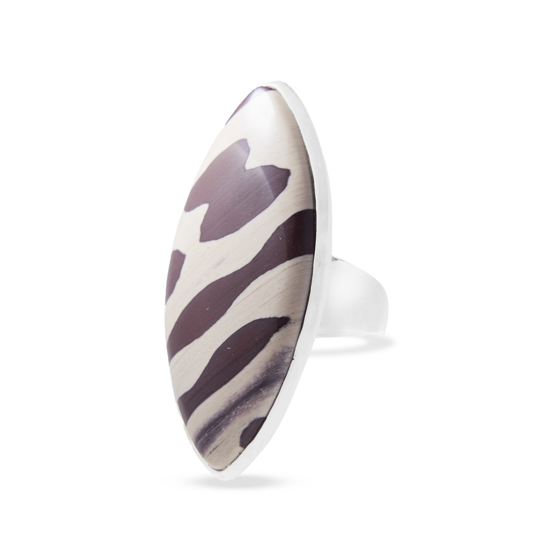 Silver ring with zebra pattern on a white background