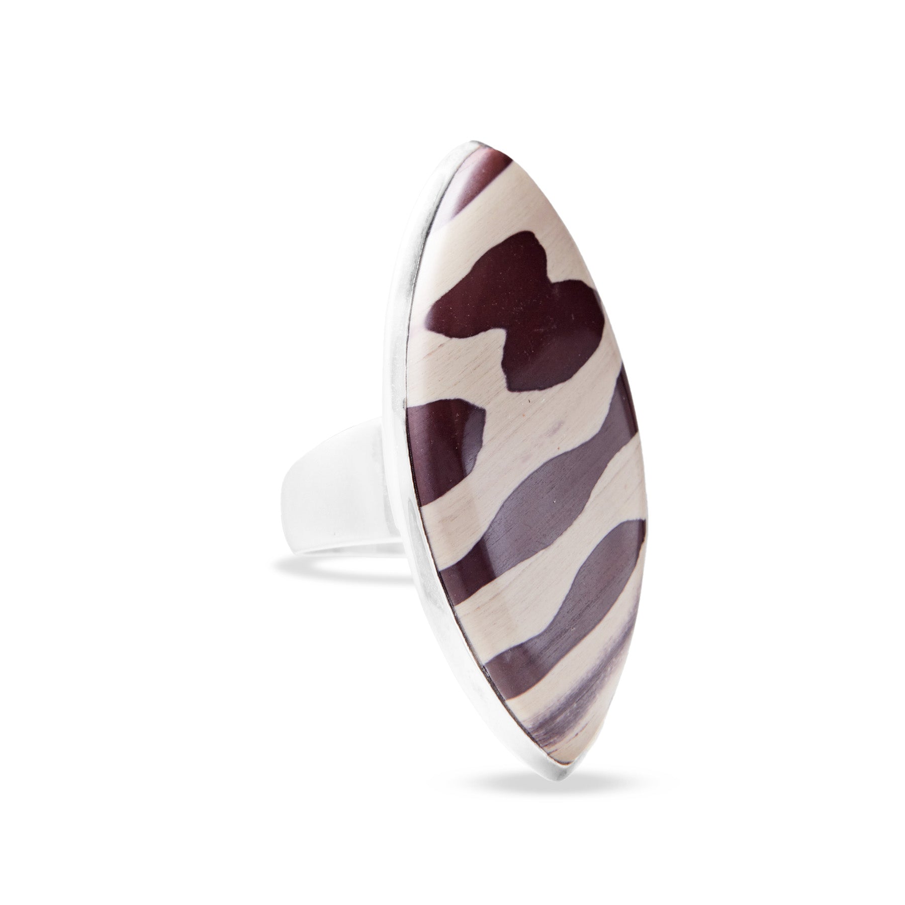 Silver ring with zebra pattern on a white background