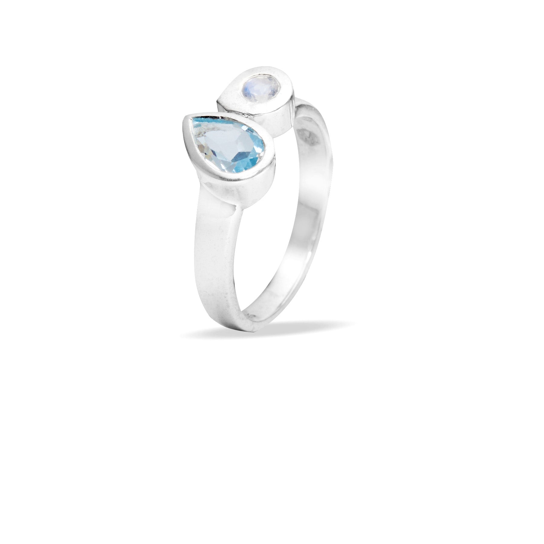 Silver ring with blue and white gemstones on a white background