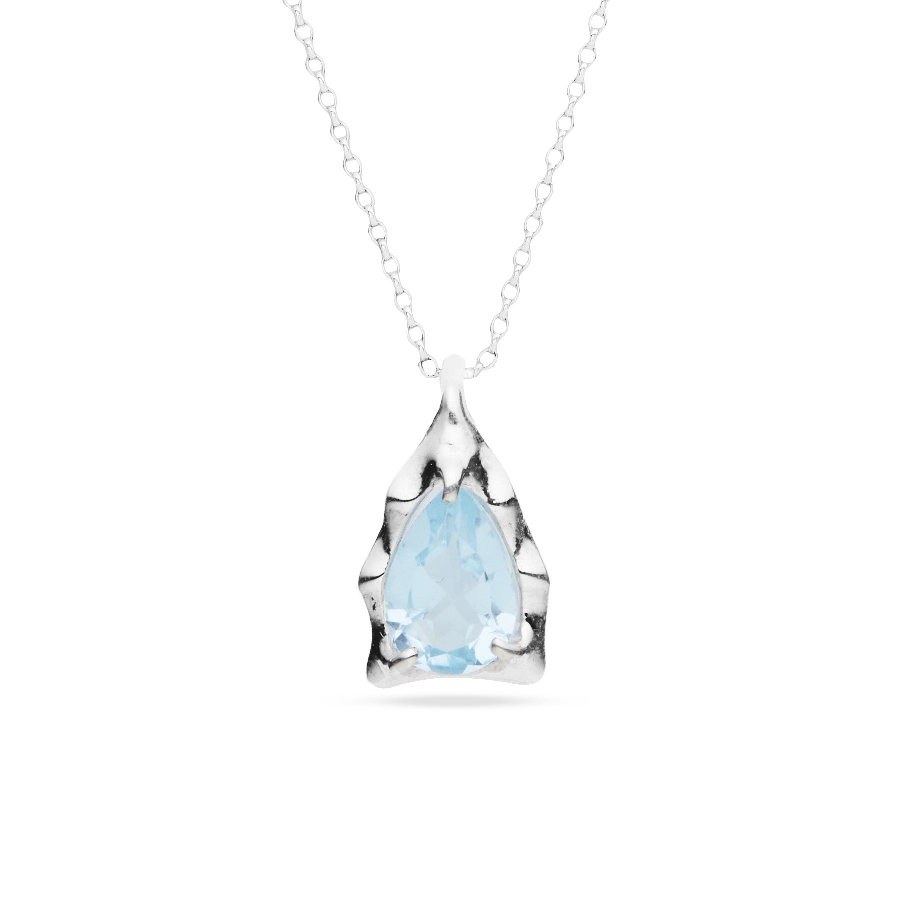 Teardrop-shaped pendant with a blue gemstone on a white background