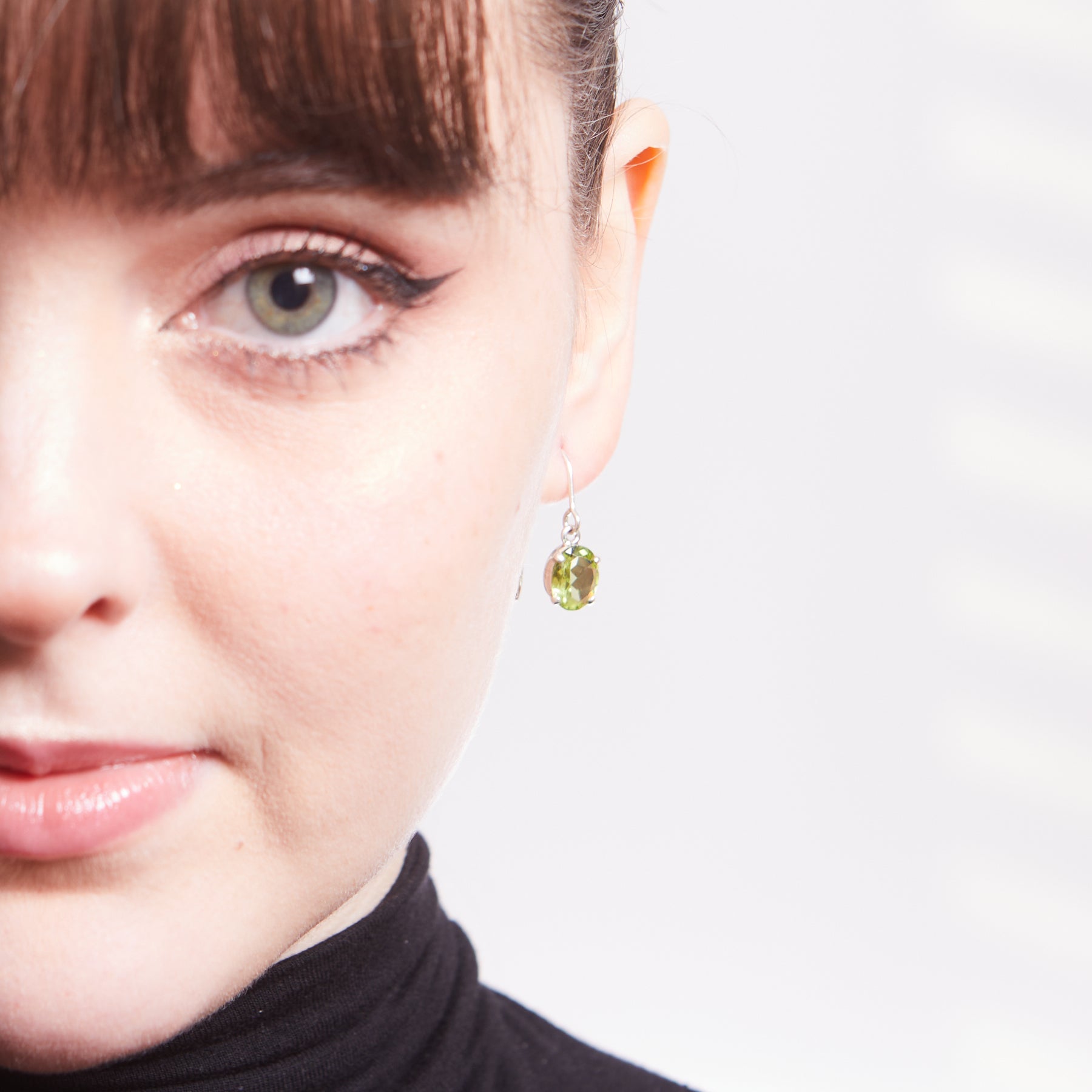 Peridot faceted oval claw Drop Earrings