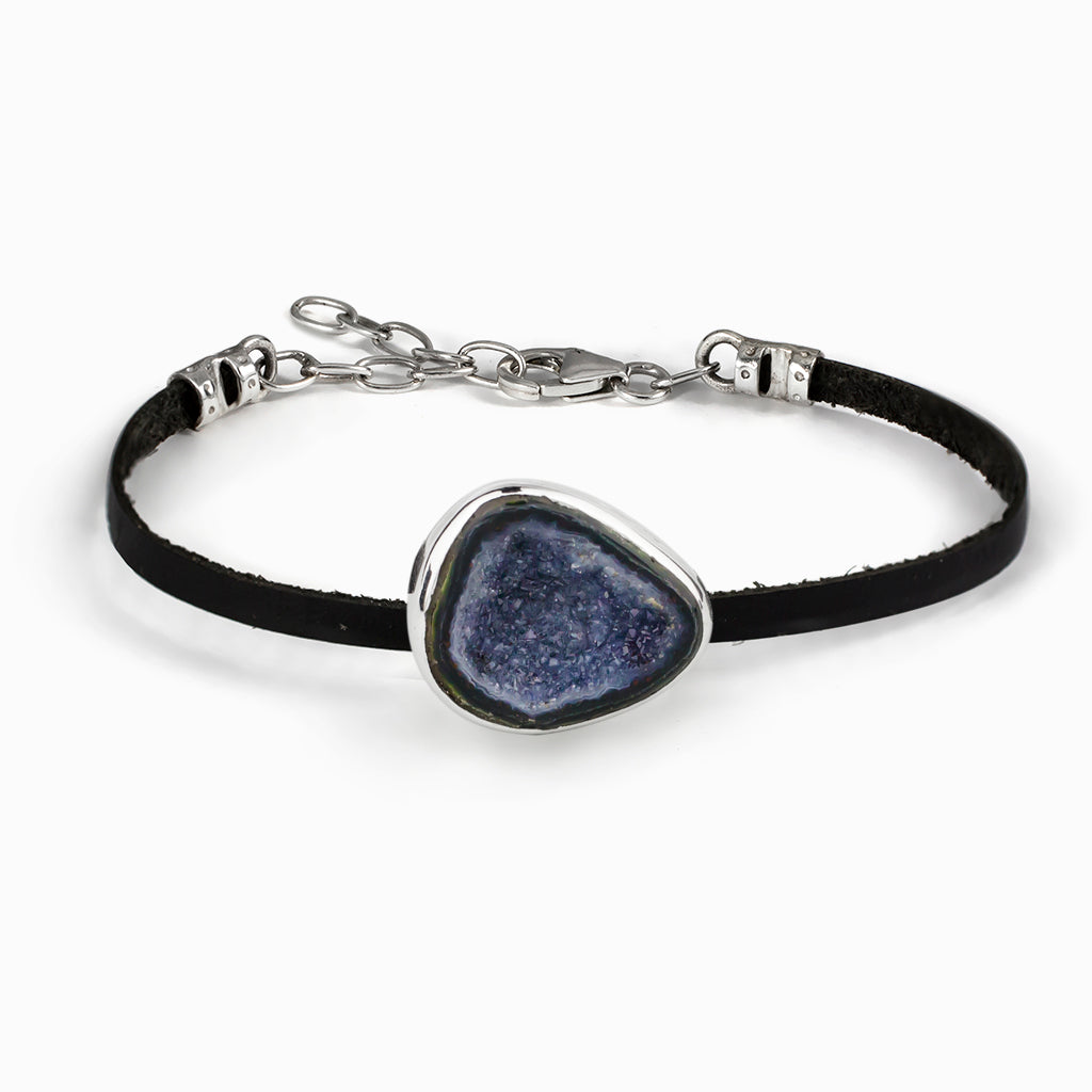 Deep blue agate with sterling silver bezel on leather band, with small chain and clasp