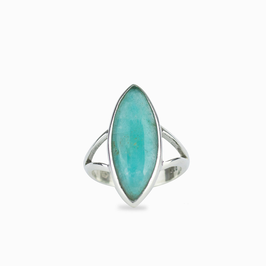 Teal coloured, cabochon cut, marquise shape, set in 925 sterling silver with a split band