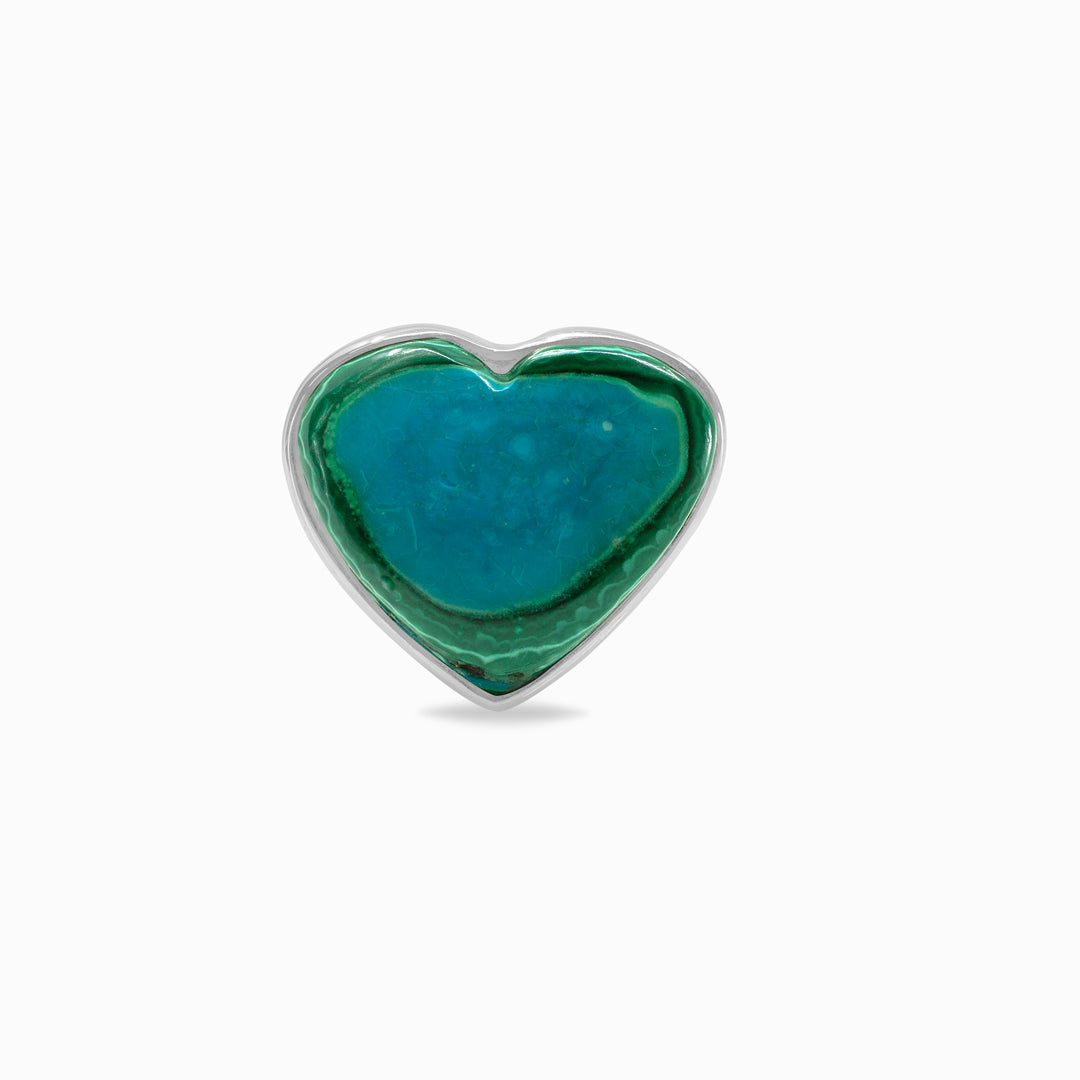 Silver ring with a heart-shaped green and blue gemstone on a white background