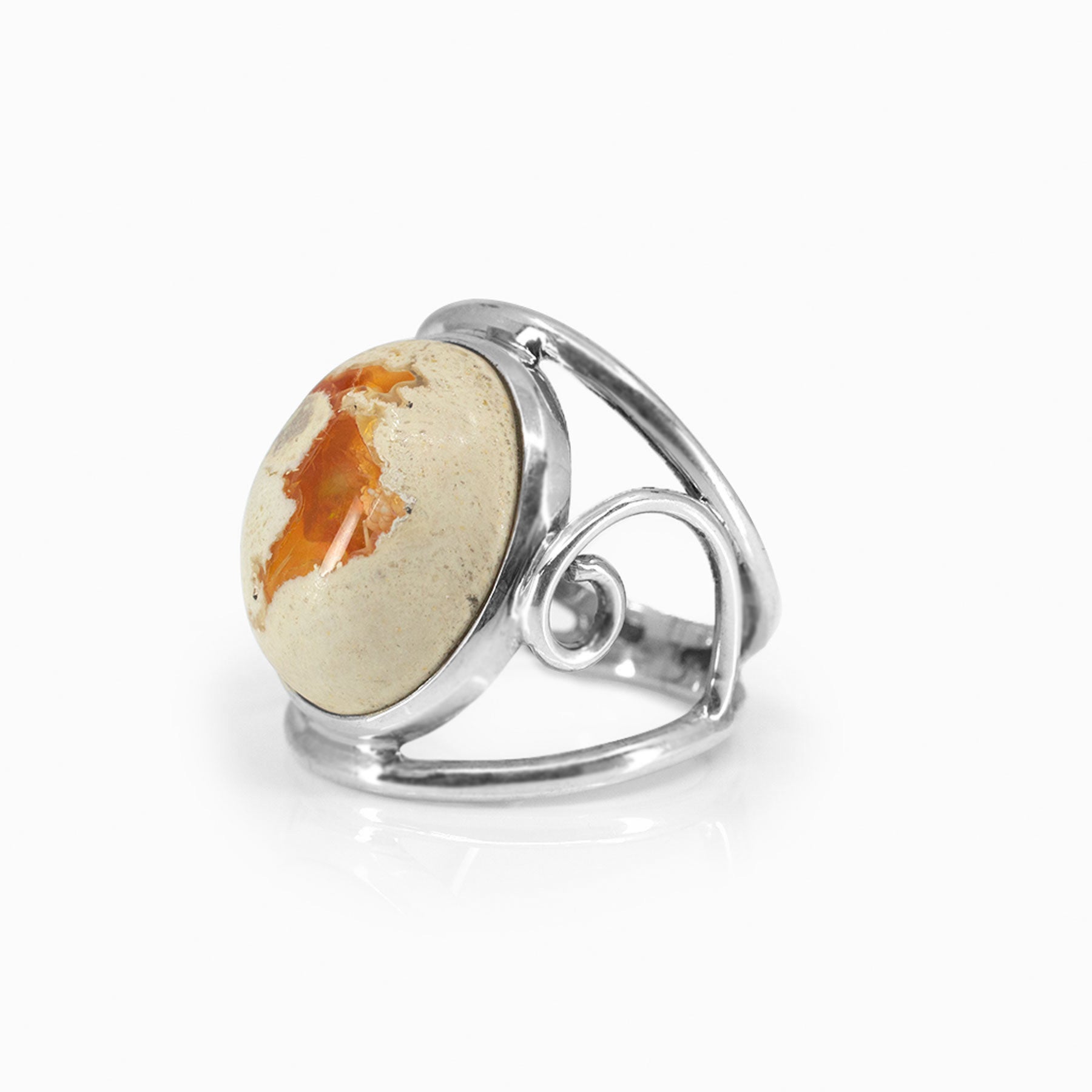 Silver ring with an Opal on a white background