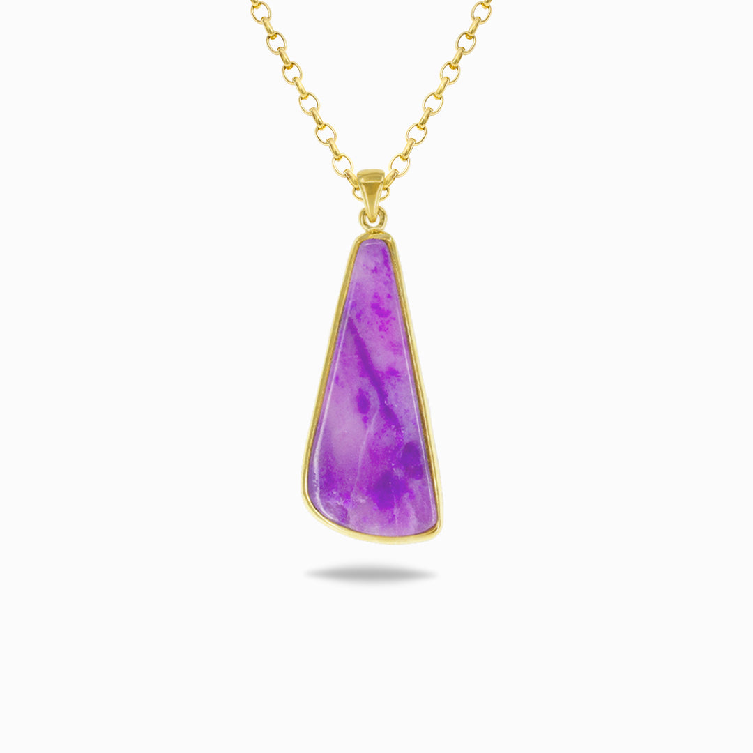Golden necklace with a purple pendant on a white background