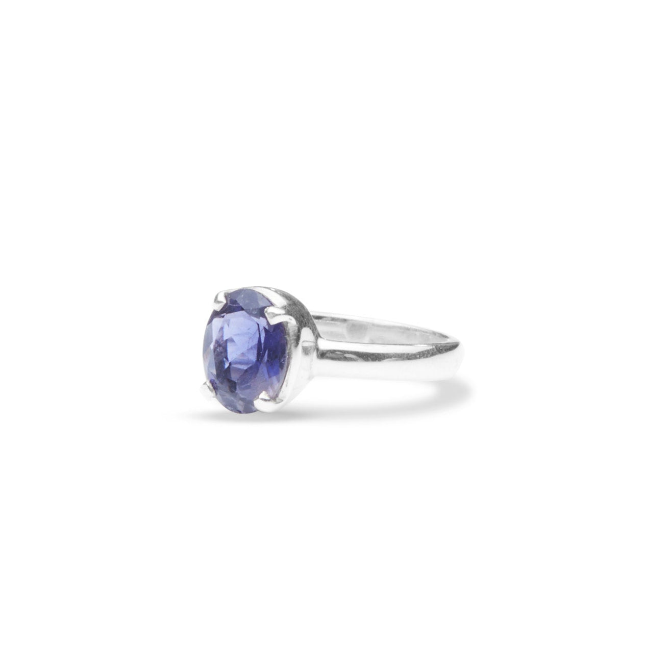 Iolite oval faceted ring with thin band and claws