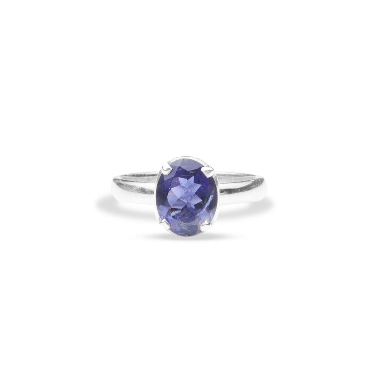 Iolite oval faceted ring with thin band and claws