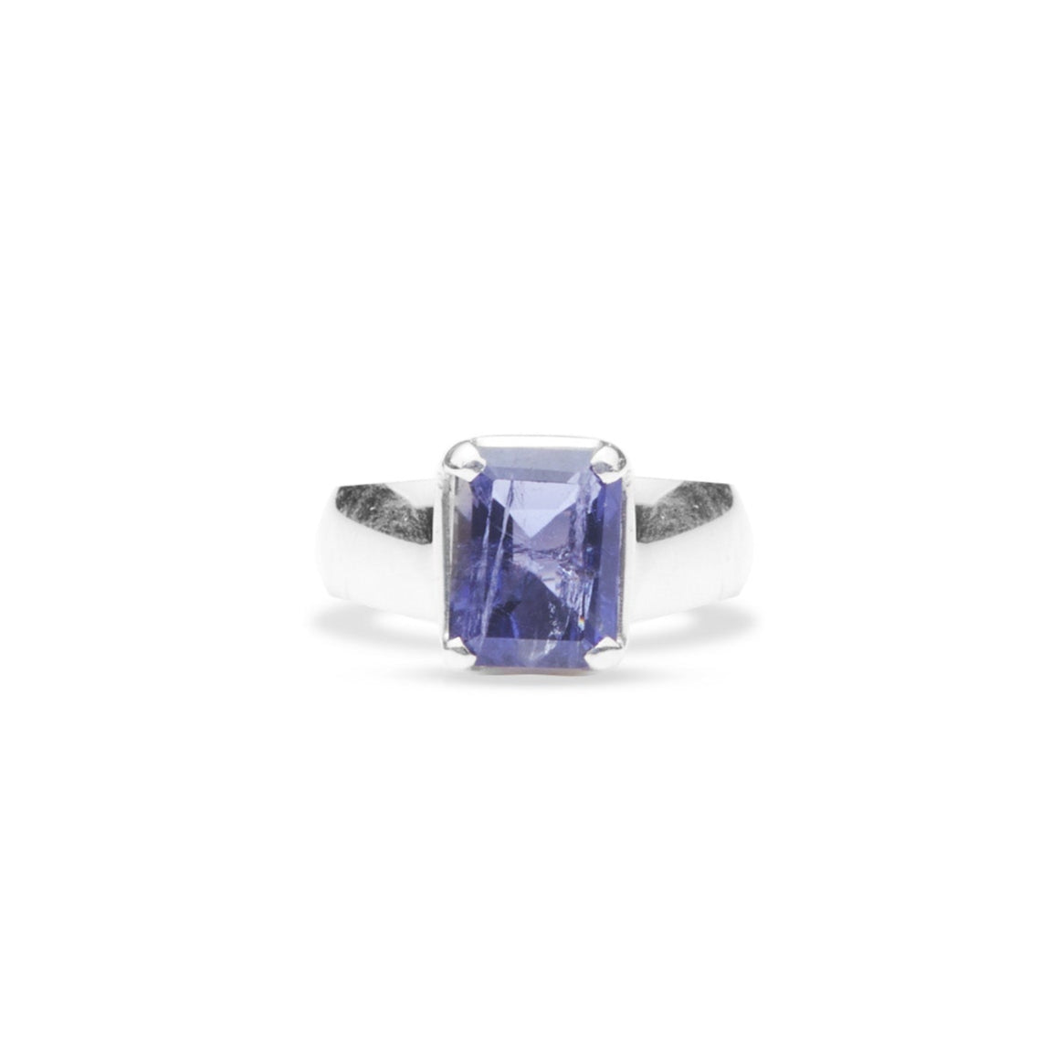 Iolite faceted rectangle claw ring witht thick band front angle