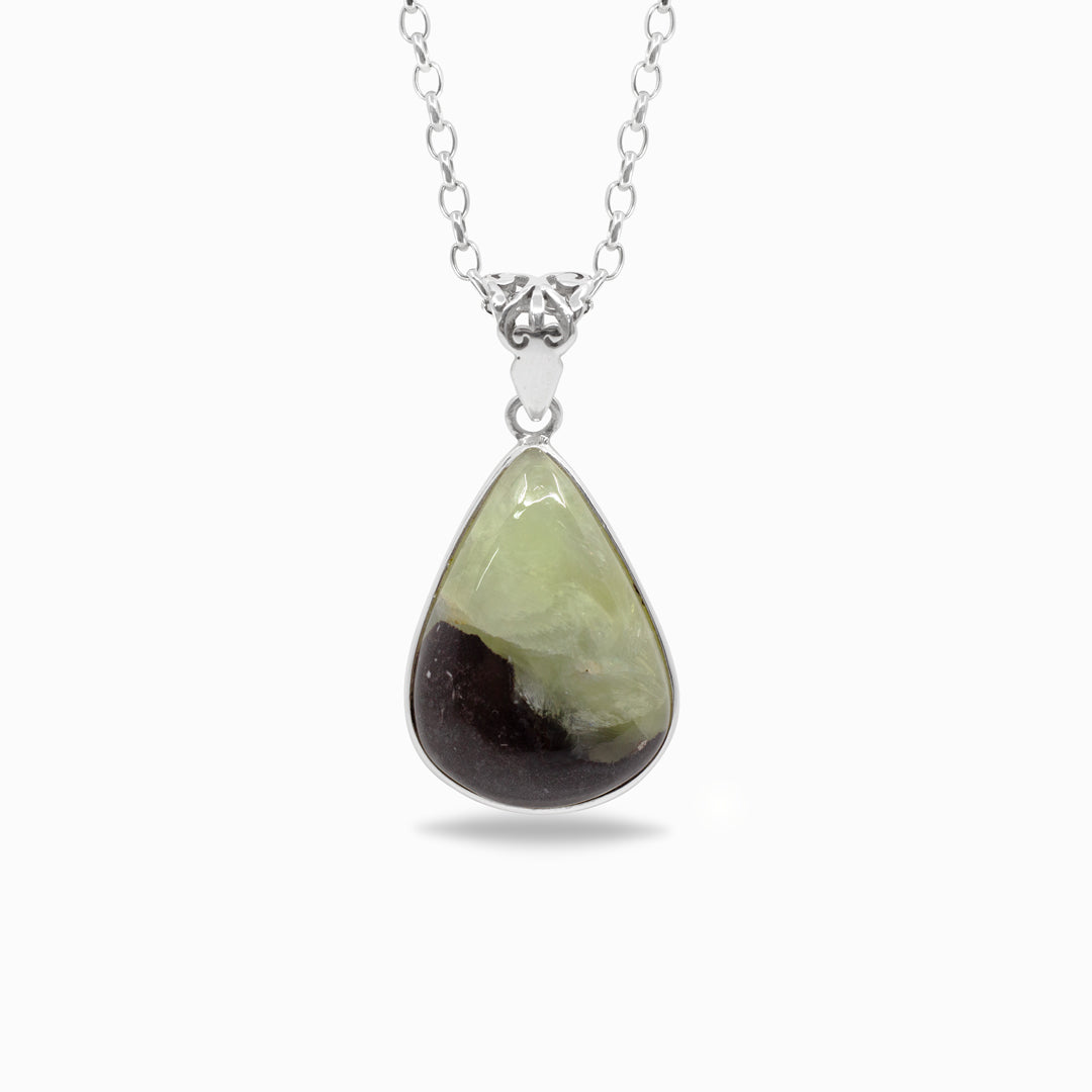 Teardrop-shaped gemstone pendant on a silver chain against a white background