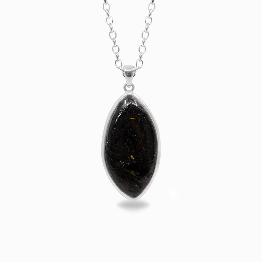 Black marquise pendant on a silver chain against a white background