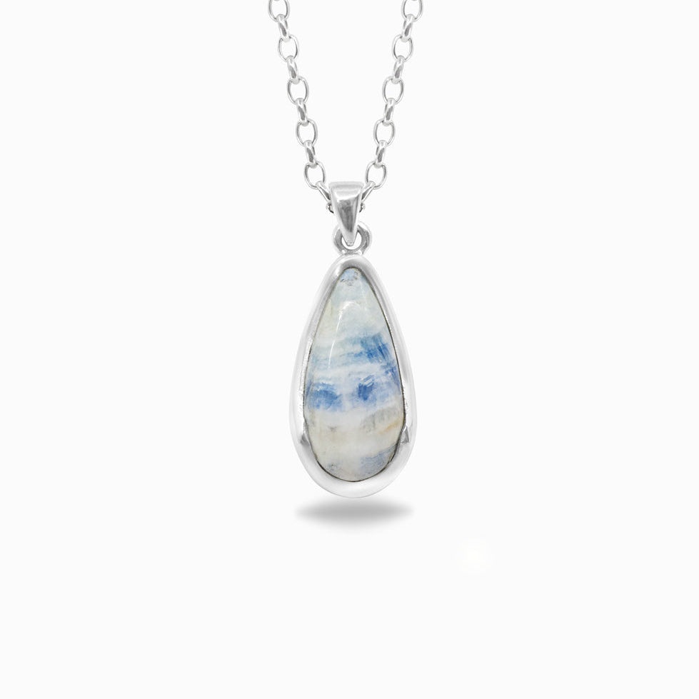 Teardrop-shaped pendant with blue and white pattern on a silver chain against a white background