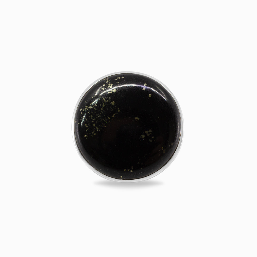 Round black stone on a white background