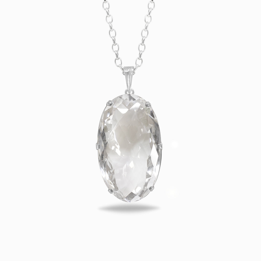 Clear crystal pendant on a white background