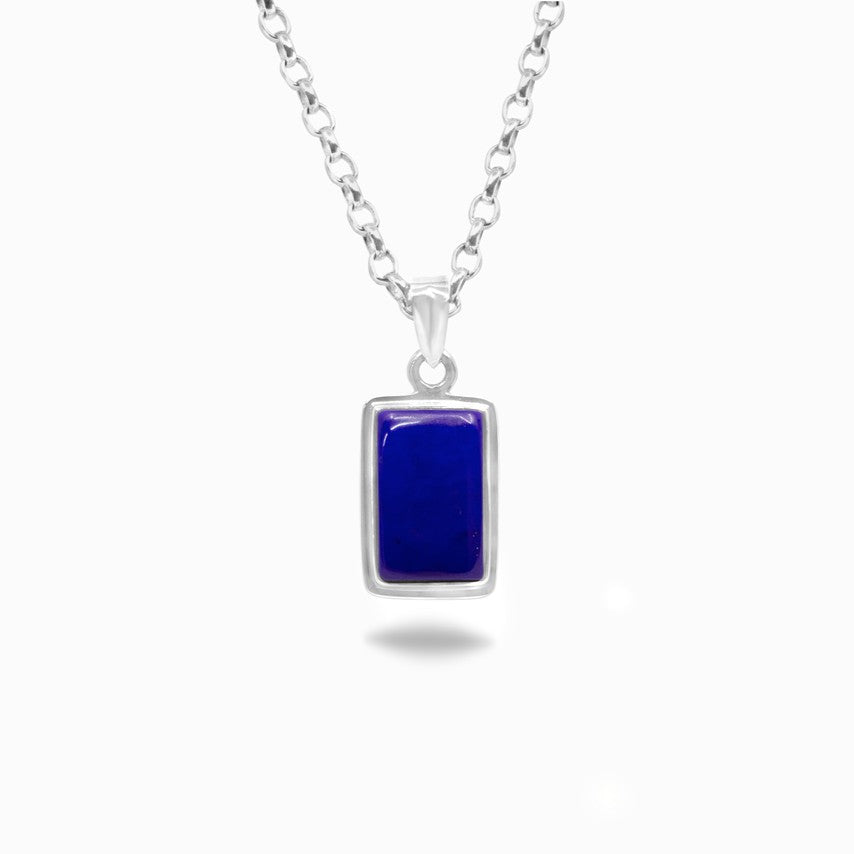 Silver necklace with a blue rectangular pendant on a white background