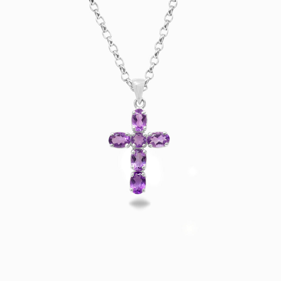 Purple cross pendant necklace on a white background