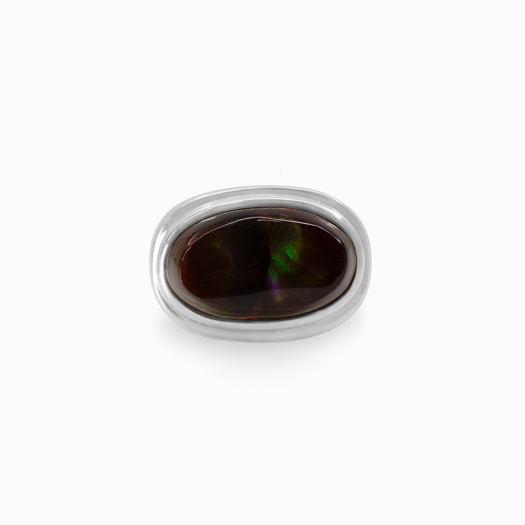 Silver ring with a brown gemstone on a white background