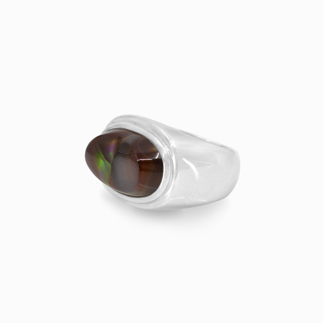 Silver ring with a brown gemstone on a white background