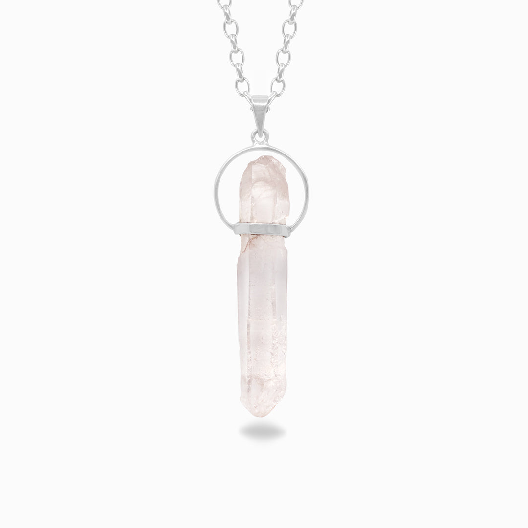 Silver necklace with a light pink stone on a white background