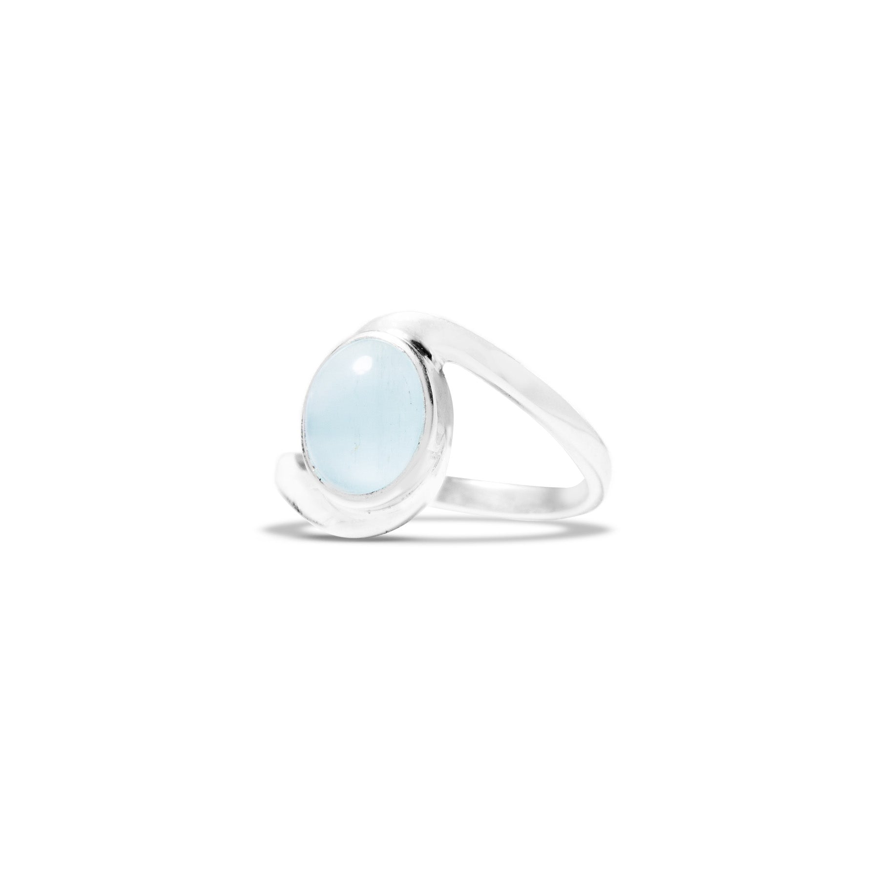 Silver ring with a light blue stone on a white background