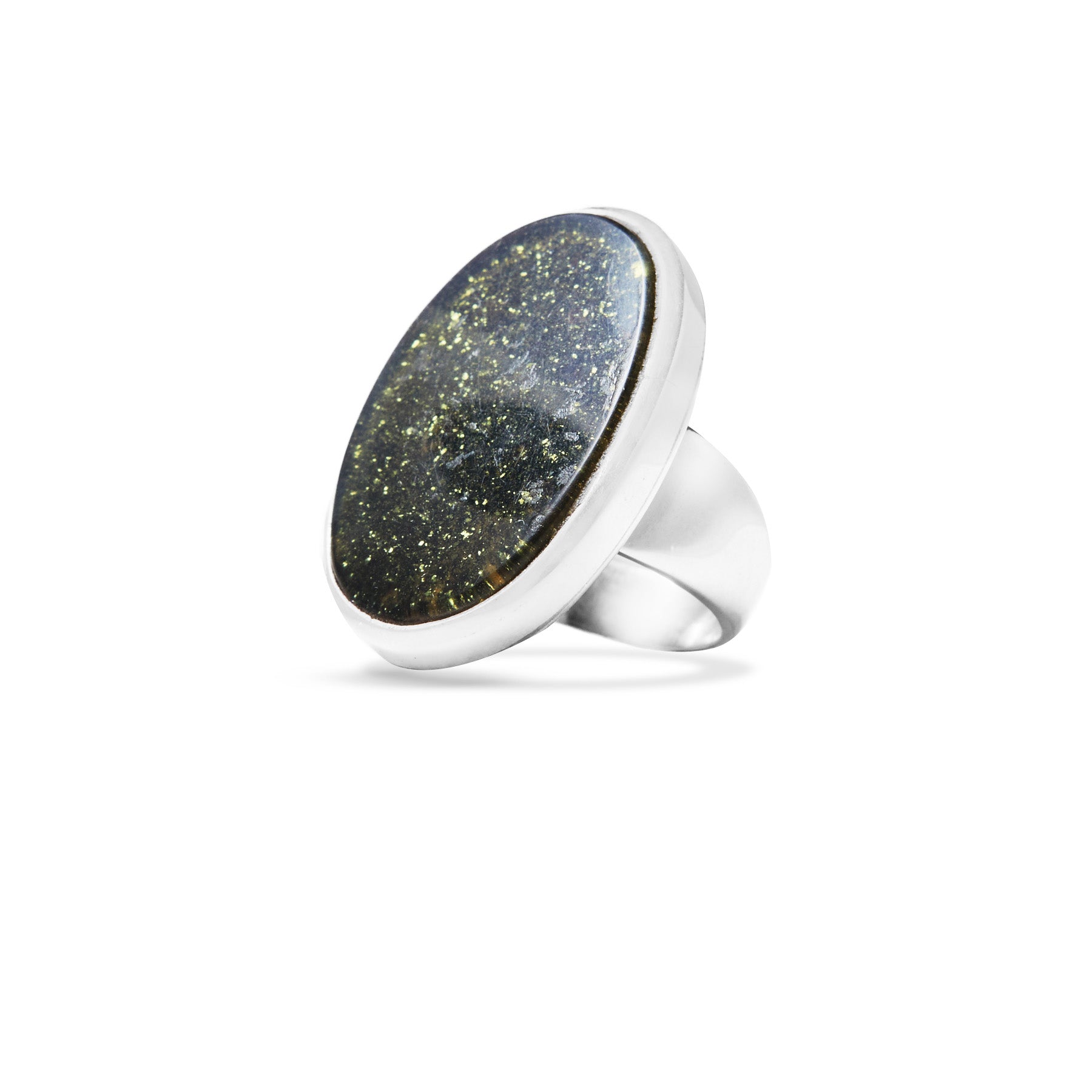 Silver ring with a black sparkly stone on a white background