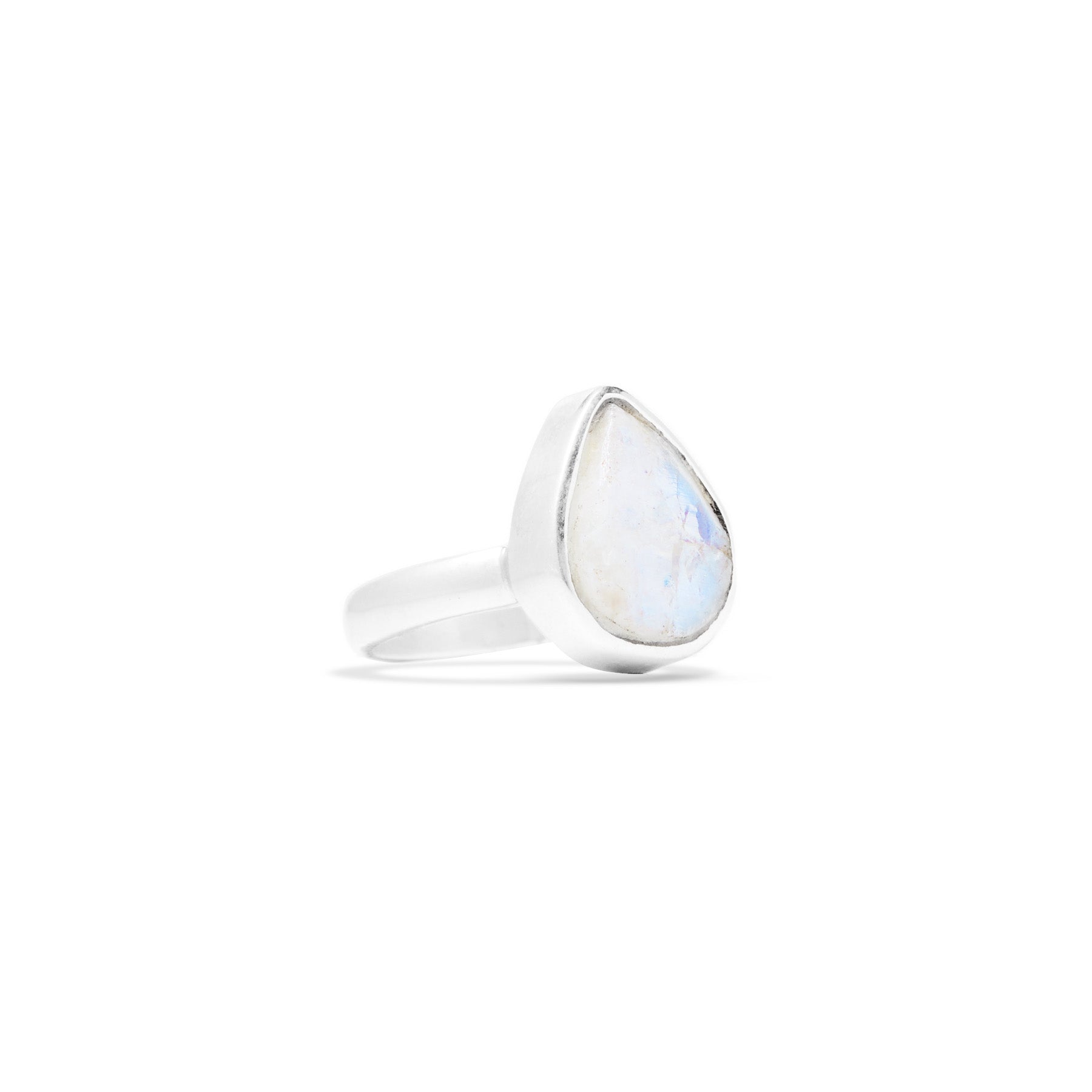 Silver ring with a rough teardrop-shaped Rainbow Moonstone on a white background.